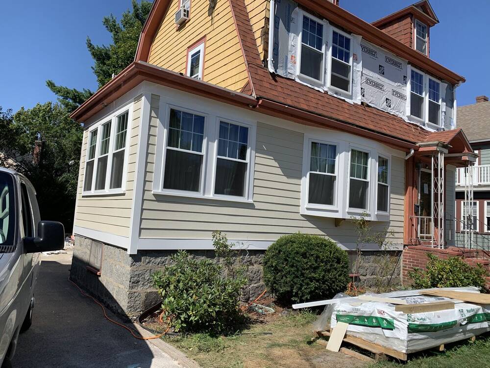 New siding and replacement windows going on the house