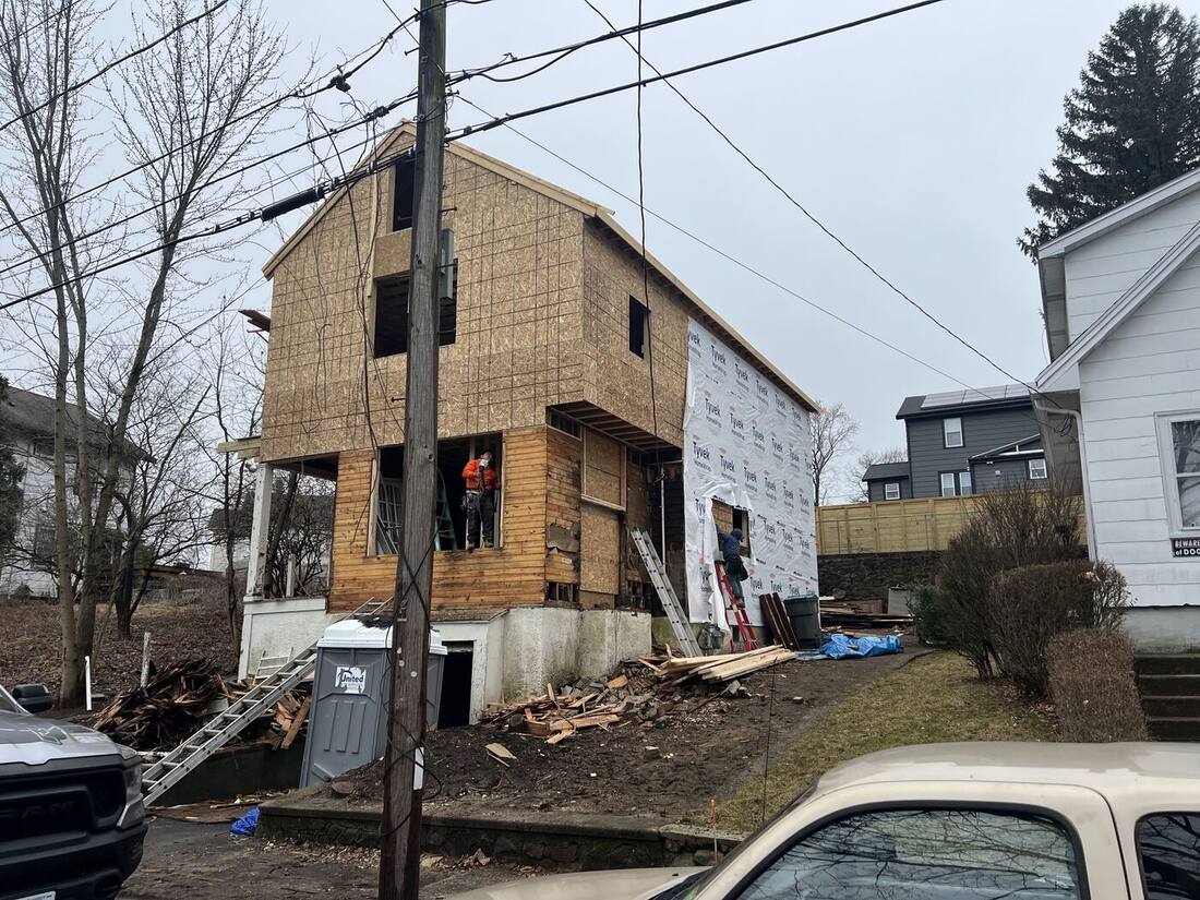 Full two-story structure sheathed