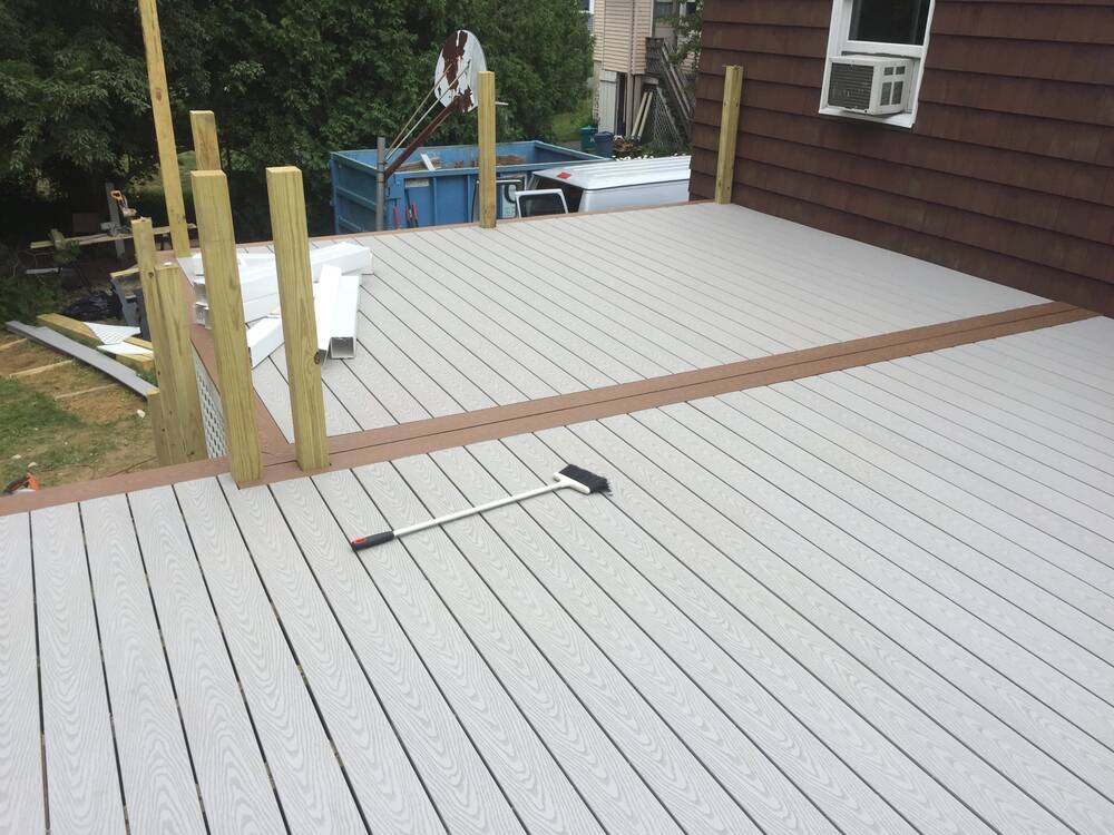 Upper deck fully decked with accent border, ready for railings