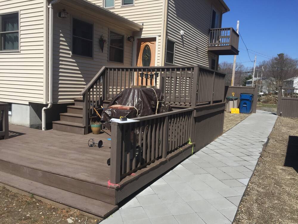 Old painted wood deck and stairs before the rebuild